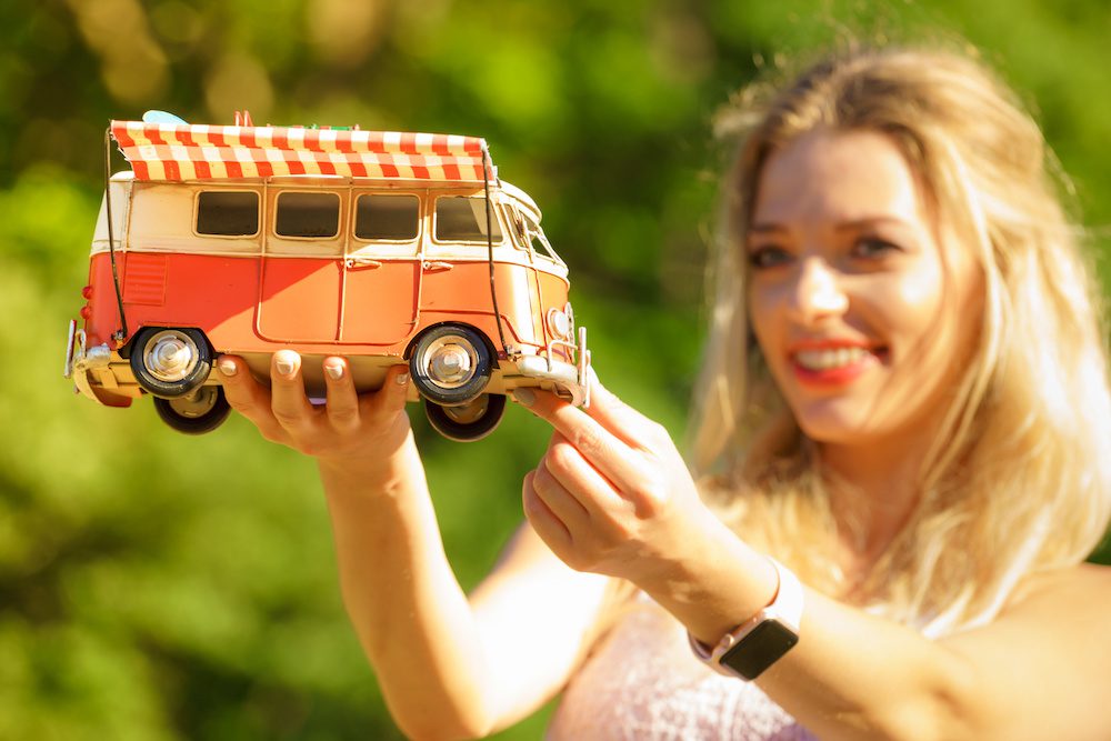 Woman holding Vintage VW Bus
