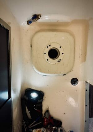 Photo showing Toilet Bolts being used to repair a Thetford toilet in a GMC Motorhome Bathroom