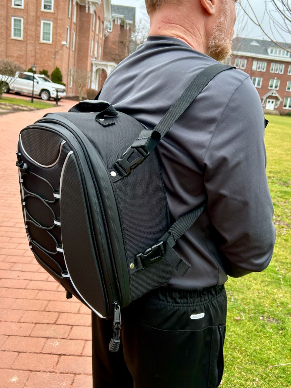 KemiMoto 30 liter Expandable Tail Bag as a backpack